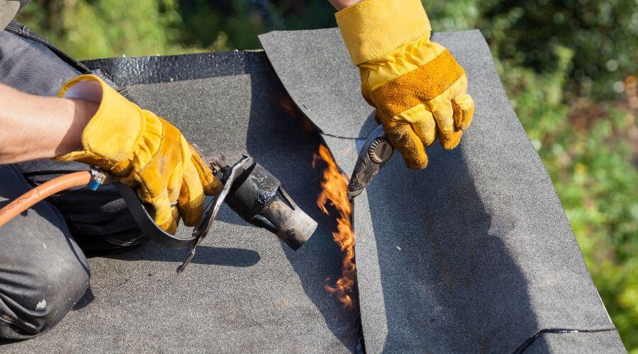 Expert tile roof repair services in Comins, MI